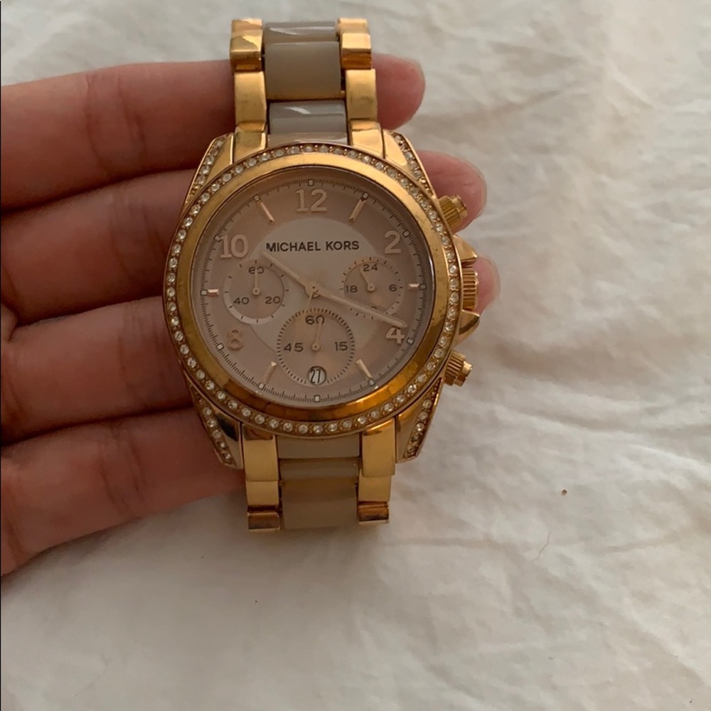 Rose gold Michael Kors diamond faced watch